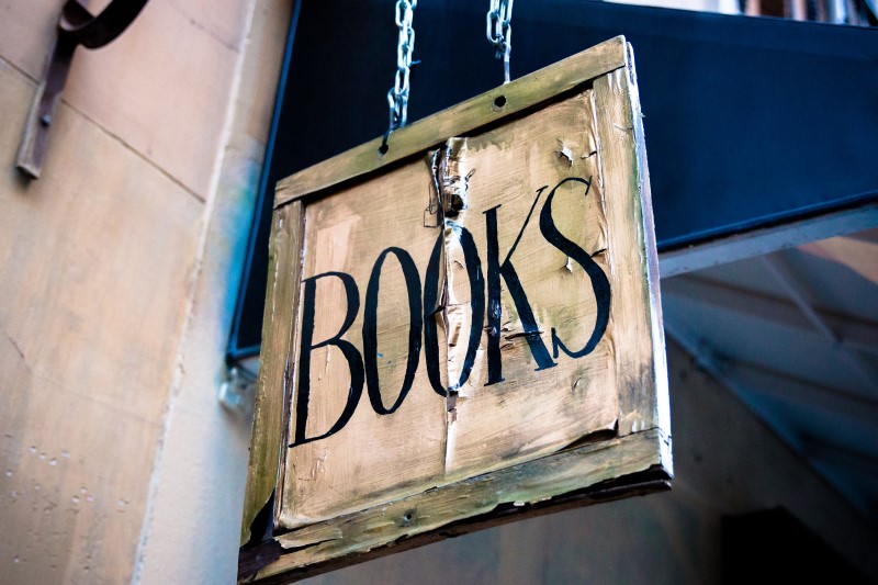 old bookshop sign that says BOOKS